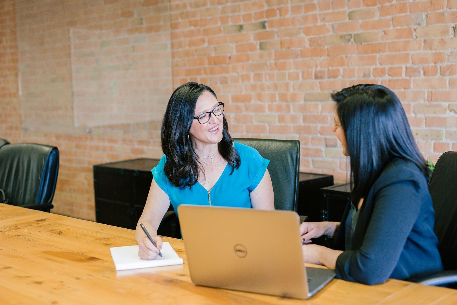 [syncsoft-auto][src:unsplash|id:1551836022-d5d88e9218df] Customer service contact center workspace — AI contact centers and the 350% search surge reshaping outsourcing