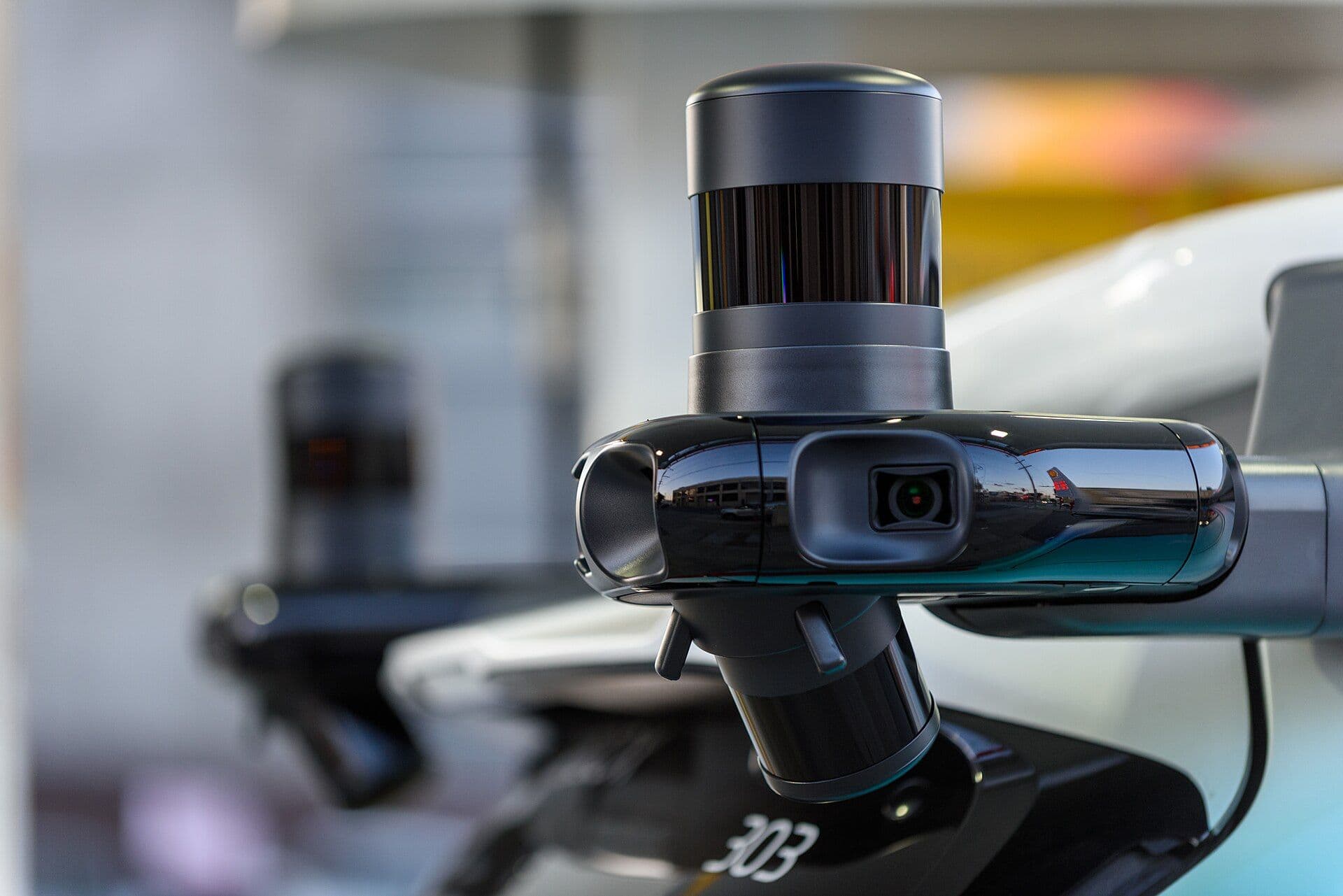[syncsoft-auto][src:wikimedia|id:Zoox_Toyota_Highlander_Sensor_Closeup_2025] Close-up of cameras and LiDAR sensors on a Toyota Highlander autonomous test vehicle — representing the multi-sensor data pipelines China end-to-end smart driving teams (BYD, NIO, XPeng, Li Auto) annotate to train 2026 VLA models.
