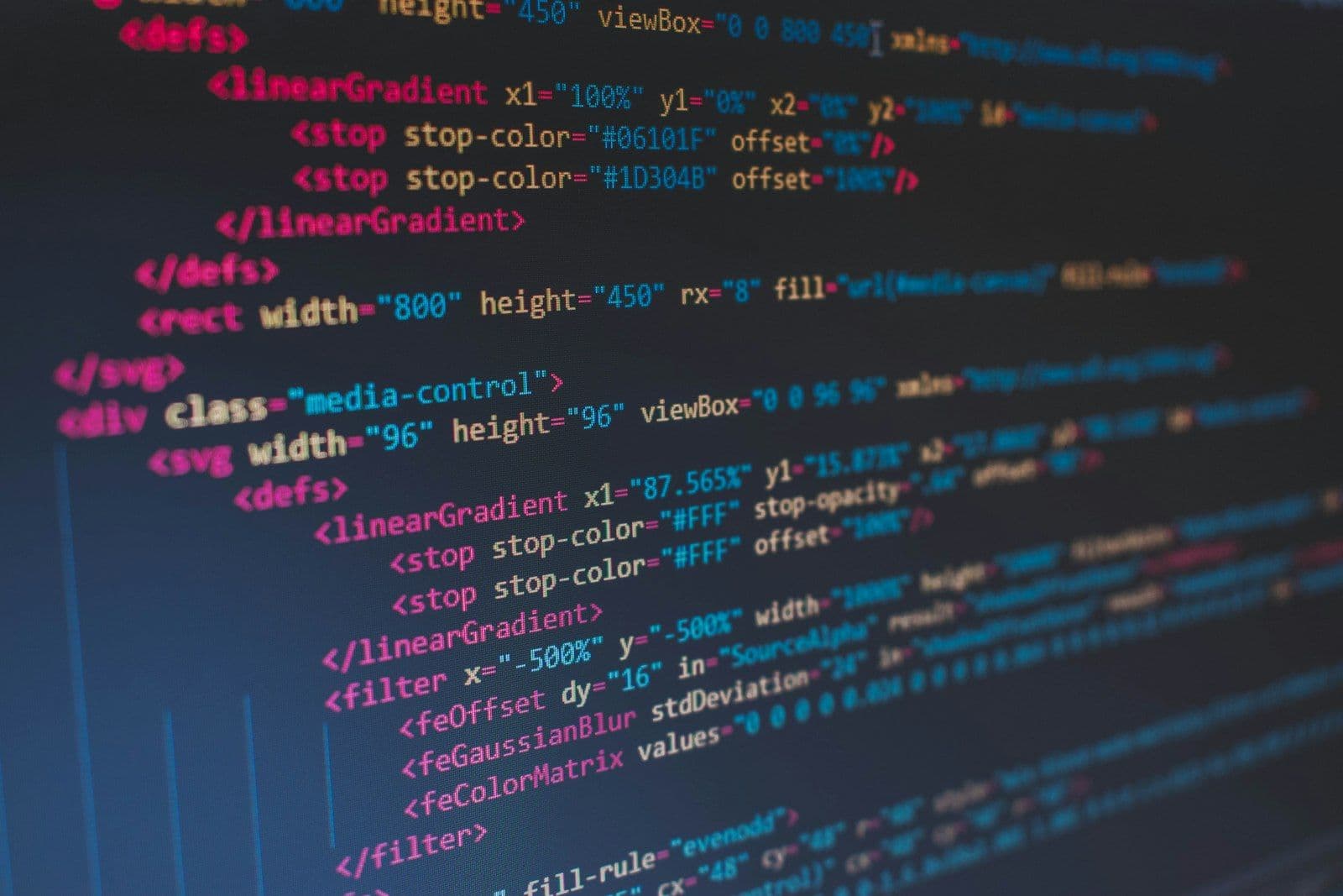 [syncsoft-auto][src:unsplash|id:1542831371-29b0f74f9713] Programmer code review screen representing GUI trajectory QA verification gates for computer-use agent annotation in 2026