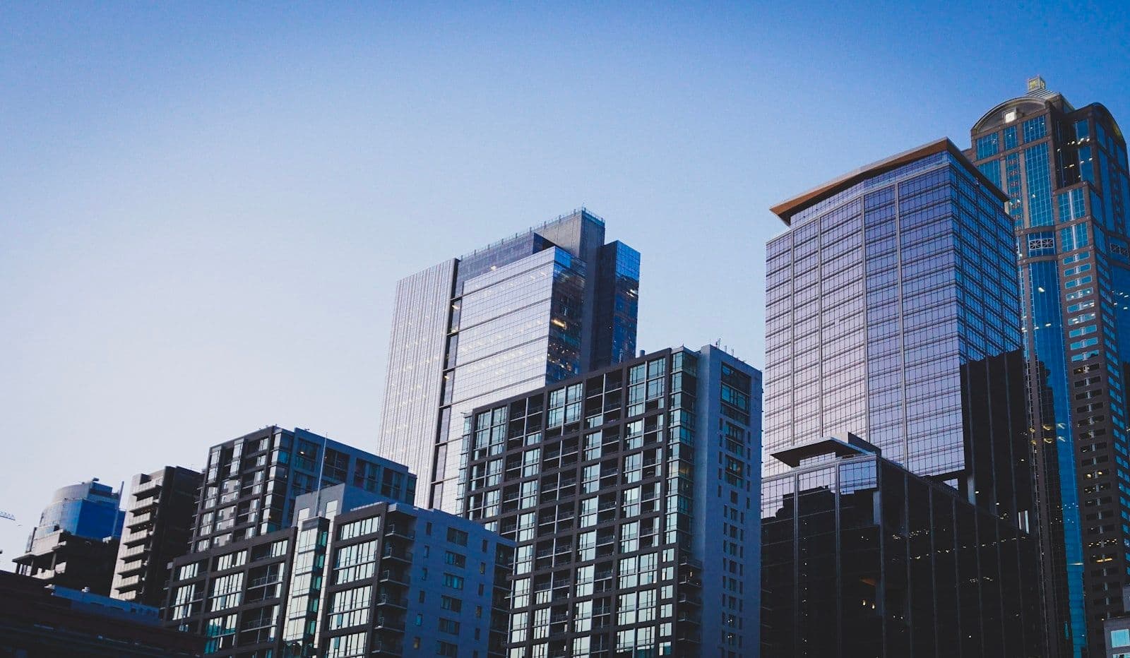 [syncsoft-auto][src:unsplash|id:1582407947304-fd86f028f716] Mortgage BPO 2026 hero image — keys, contracts and house representing agentic AI underwriting and outsourced loan operations driving 42 percent origination cost reduction