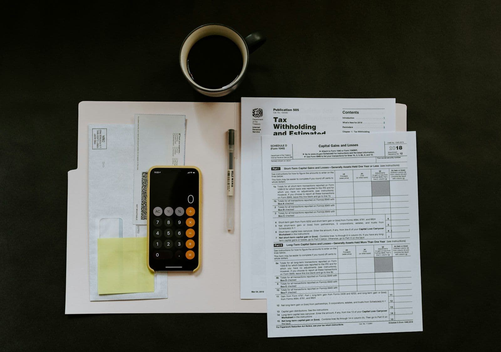 [syncsoft-auto][src:unsplash|id:1554224154-26032ffc0d07] Calculator and finance ledger on a desk — representing the agentic F&A BPO 2026 reset where AI agents process invoices and reconcile ledgers for finance and accounting outsourcing