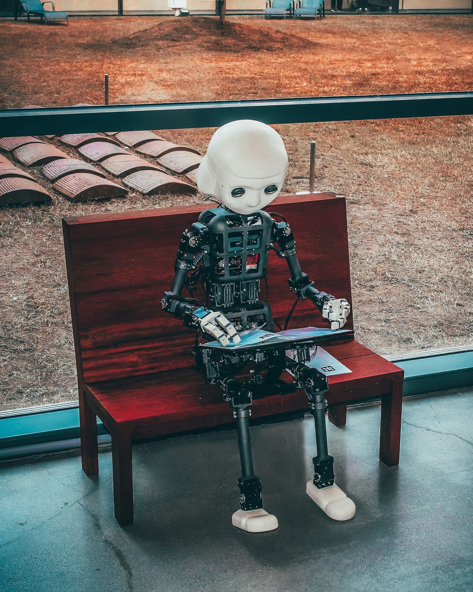 [syncsoft-auto][src:unsplash|id:1620712943543-bcc4688e7485] Tool-use trajectory annotation 2026 — humanoid robot hand reaching for human hand symbolises AI agent function calling and tool-call training data pipeline.
